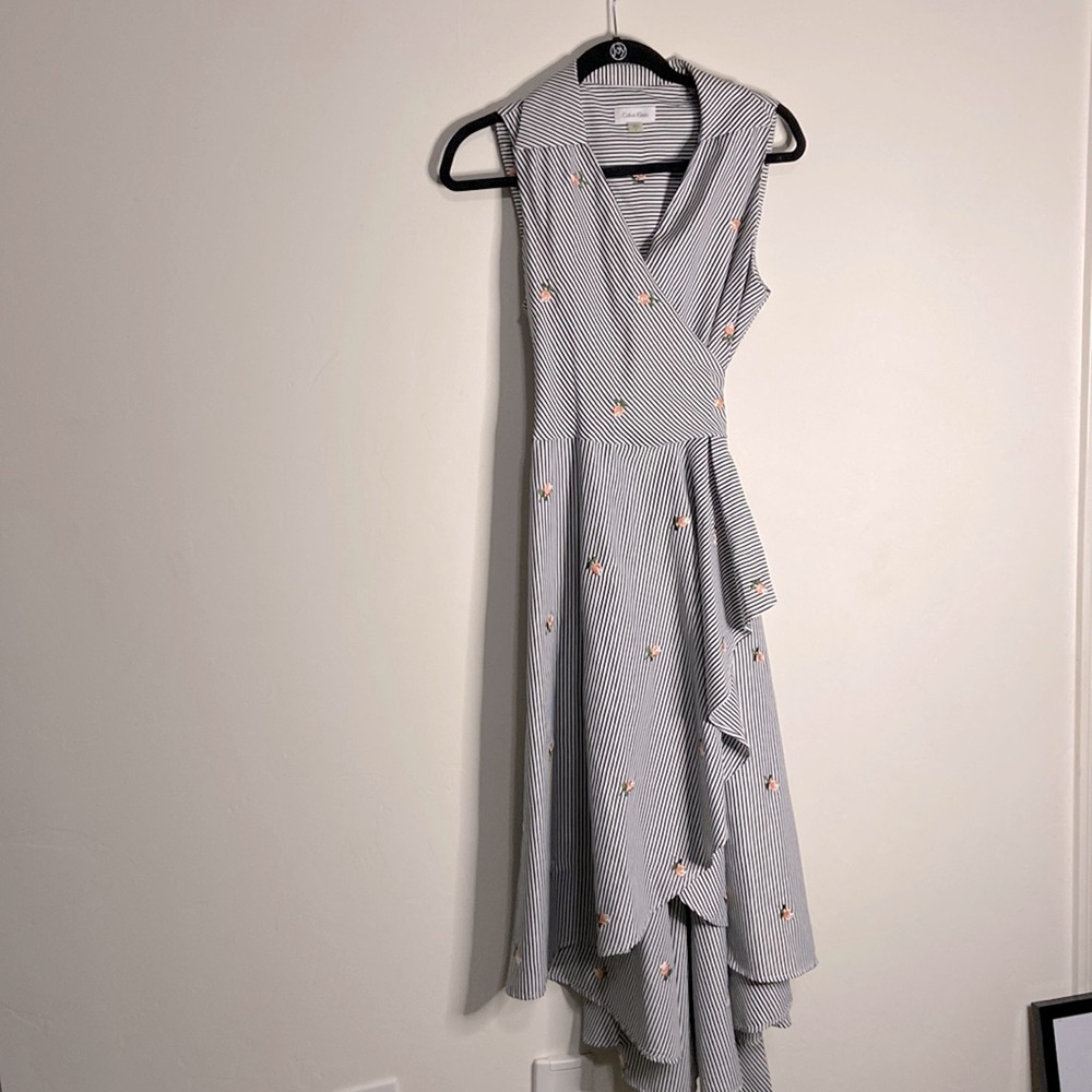 Calvin Klein sleeveless wrap dress showstopping piece asymmetrical in the bottom